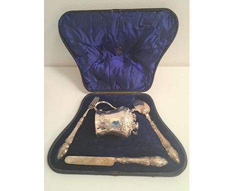 VICTORIAN SILVER CHRISTENING SETcomprising a knife, fork, spoon and small tankard in a fitted case, Sheffield 1872 by Martin 