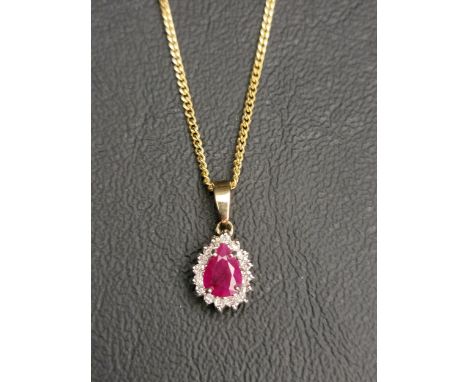 RUBY AND DIAMOND CLUSTER PENDANTthe pear cut ruby approximately 0.5cts in diamond surround, in nine carat gold and on nine ca