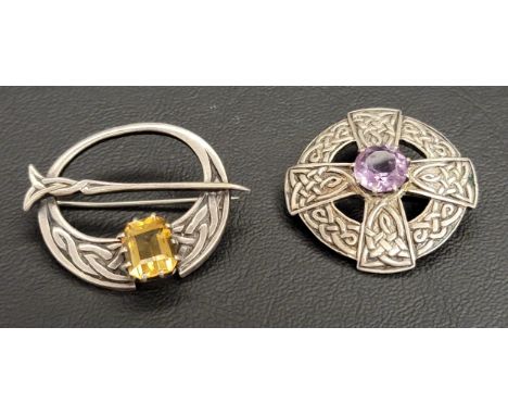 TWO JOHN HART IONA SILVER BROOCHESone a Tara style brooch set with citrine, the other of circular and cross design with centr