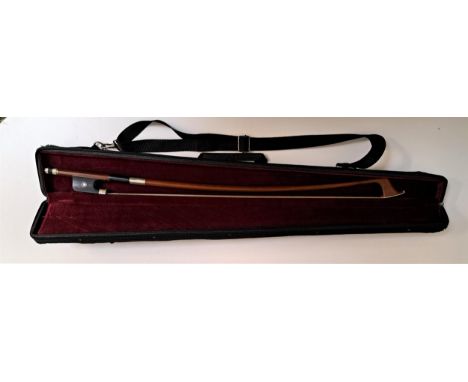 GERMAN PERNAMBUCO CELLO BOWmarked W. Dorfler with an ebony frog inlaid with mother-of-pearl, approximately 130 grams and 72cm