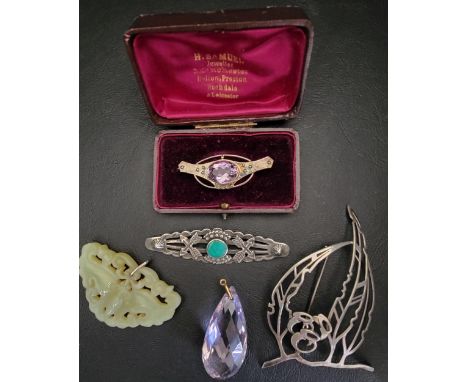 GOOD SELECTION OF JEWELLERYcomprising an Arts and Crafts Amethyst set silver and gold brooch, with hammered decoration and in