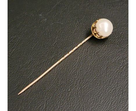 PEARL SET STICK PINin unmarked high carat gold mount 