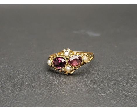 VICTORIAN GARNET AND SEED PEARL RINGin 12.5 carat gold with scroll decorated setting and engraved shank, Birmingham hallmarks