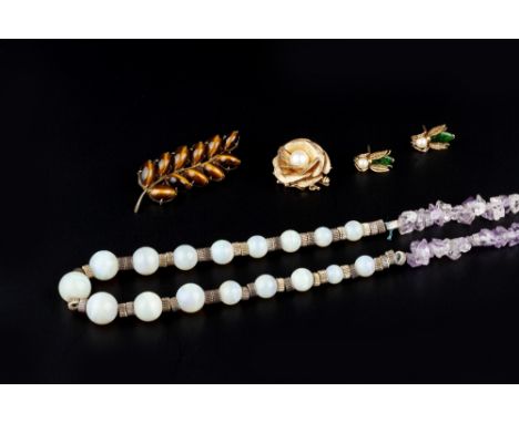 A COLLECTION OF JEWELLERY, comprising a pair of gem set insect ear studs, signed H.K. and stamped '14k 585', a cultured pearl