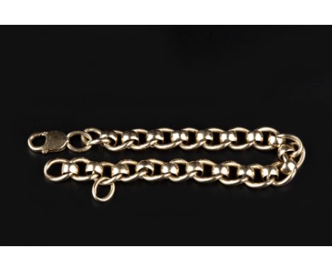 A YELLOW PRECIOUS METAL FANCY-LINK BRACELET, of roller curb-link design, with clasp stamped '375', length 21.2cm