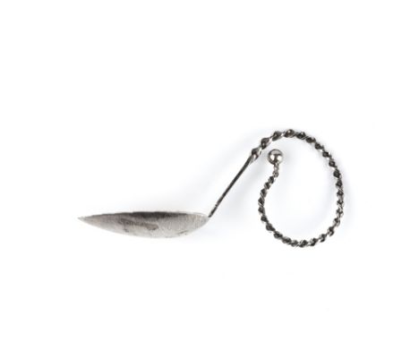 A NORWEGIAN CADDY SPOON by Marius Hammer, with textured leaf shaped bowl and curved twist handle, 11cm long