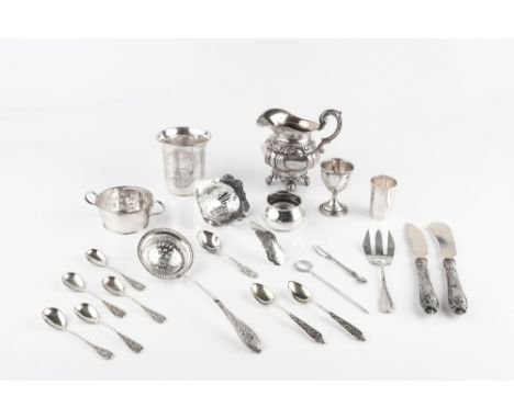 A GROUP OF MAINLY GERMAN AND DUTCH METALWARES TO INCLUDE a christening beaker, a milk jug, two sifter spoons, an egg cup, and