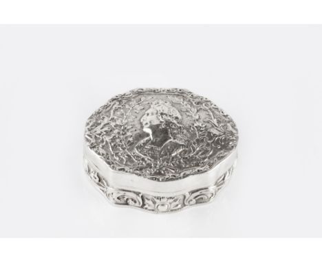 A 19TH CENTURY FRENCH SILVER BOX, of shaped oval form, the cover repoussé decorated with a female portrait and stylised scrol
