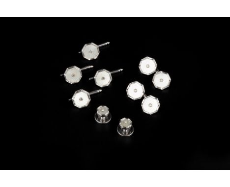 A GENTLEMAN'S DIAMOND AND MOTHER OF PEARL DRESS SET, comprising a pair of cufflinks, four buttons and two collar studs, each 