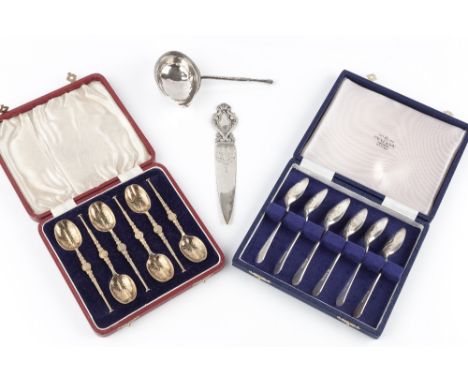 A SET OF SIX SILVER GILT ANOINTING SPOONS, Birmingham 1936, cased, further cased sets of silver tea and coffee spoons, includ