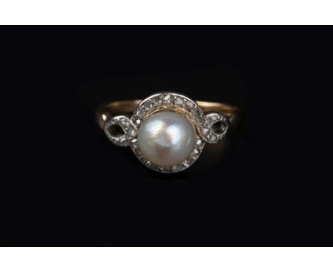 A PEARL AND DIAMOND PANEL RING, the central pearl framed by a scrolled border of rose-cut diamonds, two colour precious metal