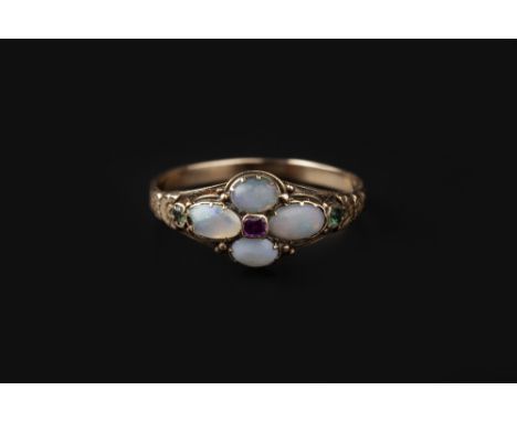 A 19TH CENTURY OPAL SET RING, centred with a cluster of four oval cabochon opals in closed-back settings, enclosing a cushion