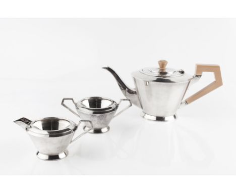 A SILVER ART DECO DESIGN SILVER THREE PIECE TEA SERVICE, of conical form, the teapot with orange composite handle and knop by