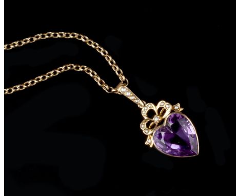 AN AMETHYST AND HALF PEARL PENDANT, the heart-shaped mixed-cut amethyst surmounted by a half pearl set ribbon bow and similar