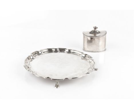 A SILVER SMALL SALVER, with piecrust border on pad feet by Selfridge &amp; Co Ltd, Birmingham 1935, presentation inscription,