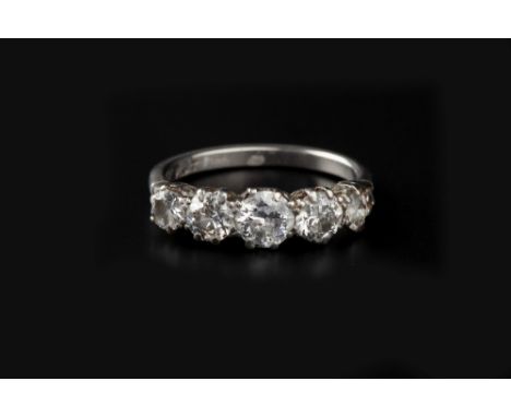 A DIAMOND FIVE STONE RING, the graduated round brilliant-cut diamonds in claw setting, white precious metal mounted, stamped 