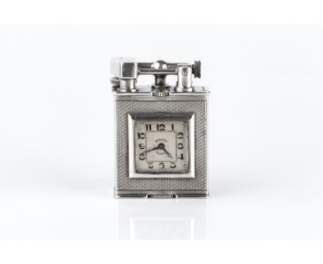 A DUNHILL PARKER-BEACON SILVER WATCH FACE LIGHTER, of rectangular design with engine turned decoration, the front with square