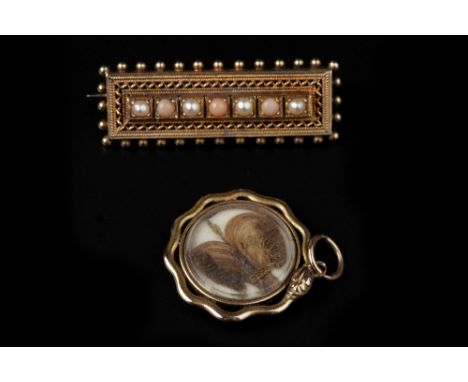 A VICTORIAN CORAL AND HALF PEARL PANEL BROOCH, the openwork rectangular panel centred with a line of alternate half pearls an