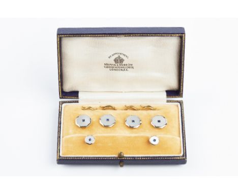 A SAPPHIRE AND MOTHER OF PEARL GENTLEMAN'S DRESS SET RETAILED BY MAPPIN &amp; WEBB LTD, comprising four buttons, each octagon