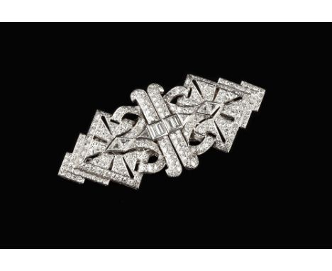 AN ART DECO DIAMOND DOUBLE CLIP BROOCH, each stepped openwork panel of stylised geometric design, set throughout with graduat