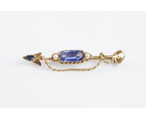 A SAPPHIRE AND HALF PEARL SET BROOCH, possibly of mining interest, modelled as an arrow/shovel applied with a ropetwist chain