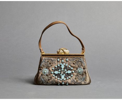 Taupe silk clutch bag with silver embroidery and aquamarine-coloured stones. Leather handle, golden clasp with central green 