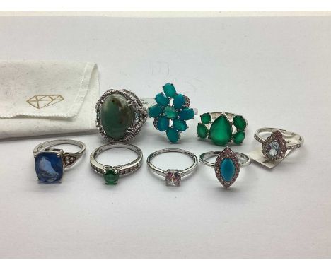 D'Joy; A "925" Zircon, Espirito Santo Aquamarine Ring, the pear shape centre stone, to halo outer, together with a collection