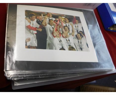A large folder of items relating to the Manchester United Neville brothers Gary and Philip. There are 53 Colour photos in thi