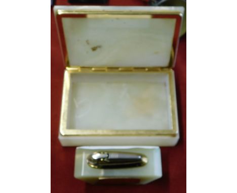 A green onyx cigarette case and lighter inscribed "Many thanks from Denis Law" Manchester United v AFC Ajax October 3rd 1973.