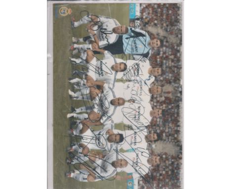 A signed colour team photo of Real Madrid from the 2002/03 season. Signed by David Beckham, Zinadine Zidane, Luis Figo, Ronal