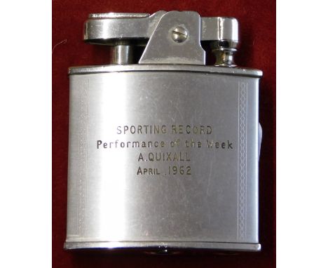 A lighter presented to Albert Quixall of Manchester United engraved with his name for the Performance of the Week in April 19