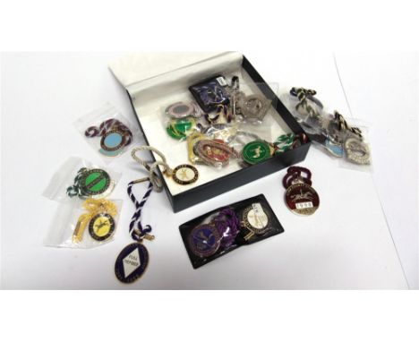 TWENTY FIVE ENAMEL HORSE RACING BADGES  Comprising Cheltenham (6); Doncaster (1); Goodwood (6); Newbury (4); Newmarket (2); P