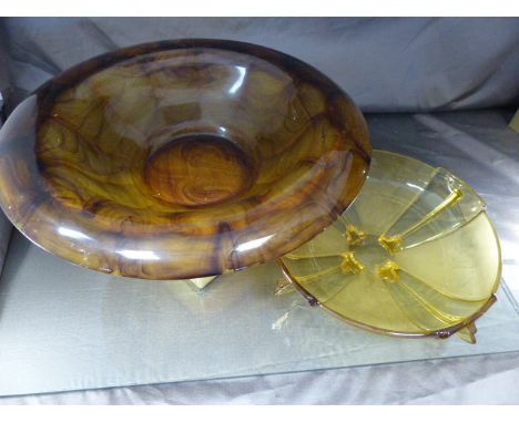 Two mid-century Amber coloured glass bowls. 1 light Amber coloured bowl in the Art Deco design along with the 2nd much darker