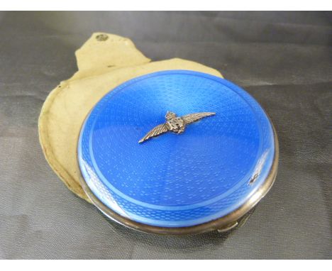 Hallmarked silver and Blue Guilloche enamel compact bearing RAF badge and wings. Retailed by Gieves Ltd London. Comes with or