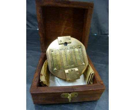 A wooden cased natural sine compass