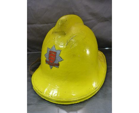 Essex Fire Brigade helmet in bright yellow ( original condition). By Makers Helmets Ltd.