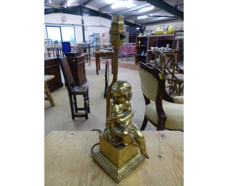 Mid Century cast brass lamp of a nude girl sat on a plinth