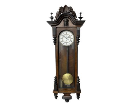 German - 8-day weight driven Vienna regulator, with a carved pediment and turned pendants and finials,  fully glazed case doo