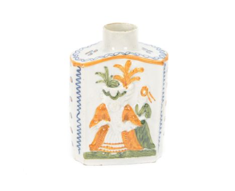 Late 18th/early 20th century Prattware tea caddy, decorated with moulded macaroni type figures to the front and back in green