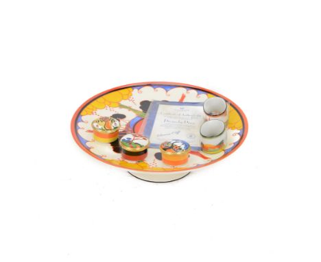 Clarice Cliff by Wedgwood pedestal tazza in Divinely Deco pattern, together with three enamel boxes in Windbells, Red Tree an