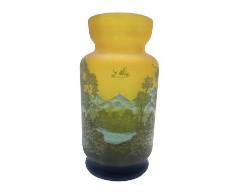 Art Nouveau style glass vase, in the style of Galle,the body decorated with woodland and mountain scene, upon a yellow ground