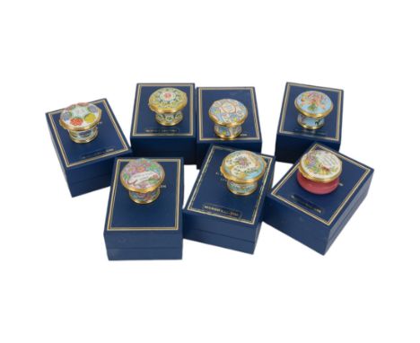 Seven Halcyon Days enamel pill boxes, including Mothers day boxes from 1998, 1999, 2000, 2001, 2002, etc, all in original box