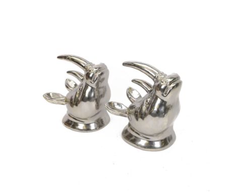 Pair of ceramic silvered rhino wall mounts, D32cm