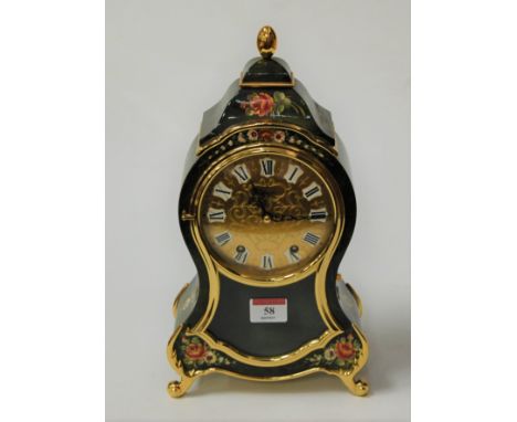A reproduction French style balloon cased bracket clock and bracket, boxed, clock h.33cm