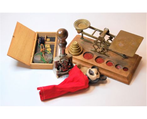 A box of miscellaneous items, to include a set of Post Office scales and weights on oak plinth, early 20th century desk seal,