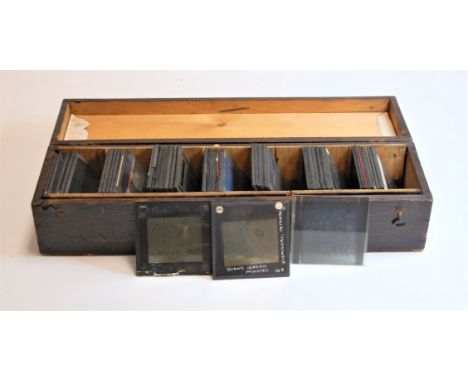 A stained pine box and contents, to include magic lantern slides, ecclesiastical and portrait examples
