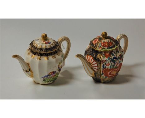 A pair of Worcester porcelain teapots, each of fluted melon shape, decorated in bright enamels, one in the Imari palette and 