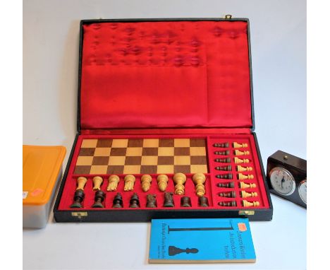 A turned box wood and ebony tournament chess set, in the Staunton pattern, height to king 7cm, together with ***ANOTHER CHESS