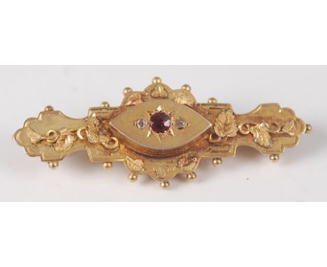 An early 20th century 9ct gold, ruby and diamond point set bar brooch, 3.4g, 4.5cm