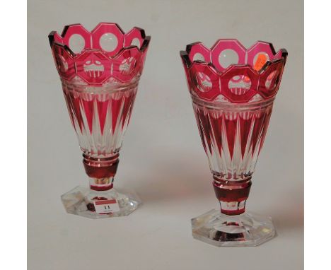 A pair of Bohemian ruby overlay vases of tapering conical form to octagonal bases, height 23cm